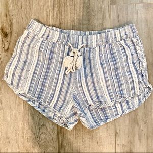 Blue and white striped drawstring shorts